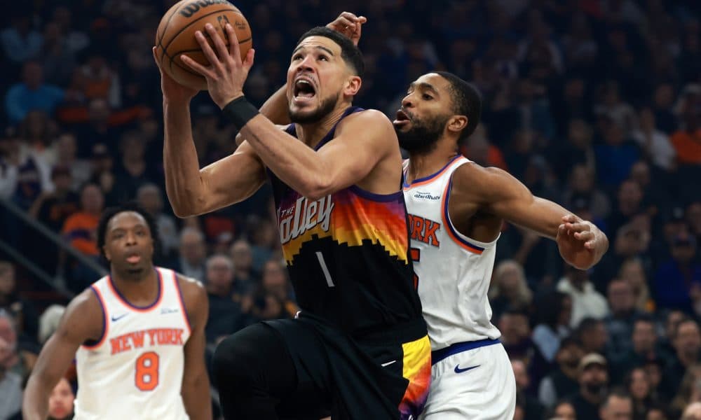 Devin Booker Soars with Dunk as Suns Defeat Knicks in Thrilling Match