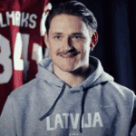 Latvian Forward Tralmaks Shut Out as Latvia Falls 5-1 in Olympic Clash